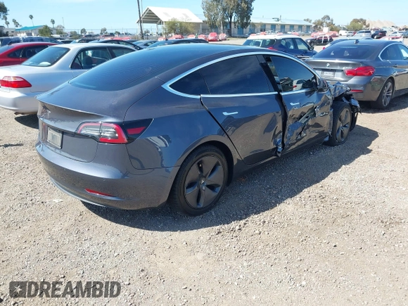 2020 Tesla Model 3 Standard Range Plus with VIN 5YJ3E1EA5LF644282, listed as a IAAI auction lot 41710124 with 69,969 mi miles and . Bid and sale history available at DreamBid. Image 4.