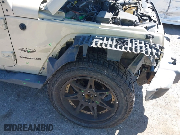 2011 Jeep Wrangler Sahara with VIN 1J4AA5D13BL562732, listed as a IAAI auction lot 41838520 with 148,359 mi miles and . Bid and sale history available at DreamBid. Image 6.
