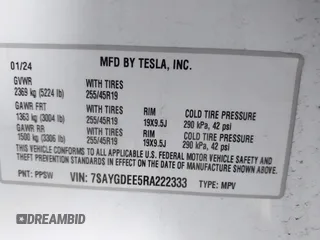 2024 Tesla Model Y Long Range with VIN 7SAYGDEE5RA222333, listed as a IAAI auction lot 41944404 with 12,176 mi miles. Bid and sale history available at carsss.com. Image 9.