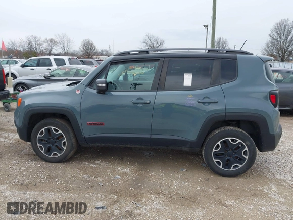 2015 Jeep Renegade Trailhawk z VIN ZACCJBCT4FPB79254, wystawiony jako IAAI lot #41965451 z przebiegiem 87 398 mil mil oraz . Historia ofert i sprzedaży dostępna na DreamBid. Obrazek 14.