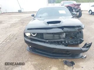 2016 Dodge Challenger R/T Scat Pack z VIN 2C3CDZFJ4GH118973, wystawiony jako IAAI lot #41960654 z przebiegiem 180 315 mil mil oraz . Historia ofert i sprzedaży dostępna na DreamBid. Obrazek 6.