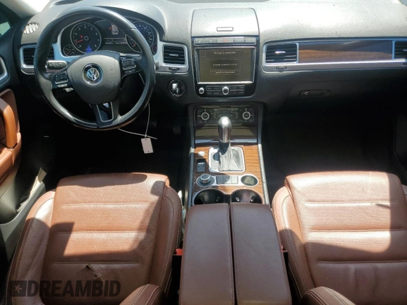 2016 Volkswagen Touareg Sport with VIN WVGEF9BP0GD007399, listed as a Copart auction lot 53990675 with 110,439 mi miles and Salvage Title. Bid and sale history available at DreamBid. Image 8.
