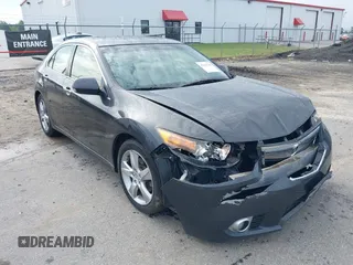 2012 Acura TSX with VIN JH4CU2F45CC016817, listed as a IAAI auction lot 42104700 with 148,617 mi miles. Bid and sale history available at carsss.com. Image 1.