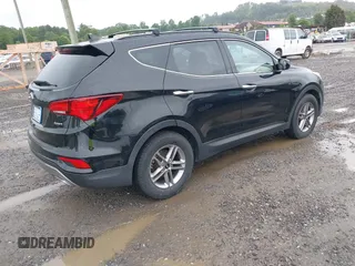 2017 Hyundai Santa Fe 2.4L z VIN 5NMZU3LB3HH011127, wystawiony jako IAAI lot #42369671 z przebiegiem 91 634 mil mil oraz . Historia ofert i sprzedaży dostępna na DreamBid. Obrazek 4.