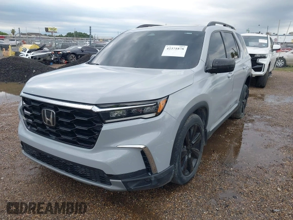 2024 Honda Pilot Touring z VIN 5FNYG1H71RB005034, wystawiony jako IAAI lot #42371878 z przebiegiem Nie podano mil oraz . Historia ofert i sprzedaży dostępna na DreamBid. Obrazek 6.