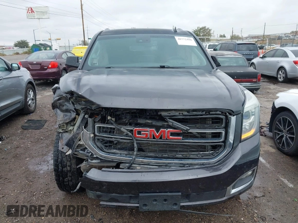2015 GMC Yukon XL SLT with VIN 1GKS1HKC8FR219289, listed as a IAAI auction lot 40772496 with 163,477 mi miles. Bid and sale history available at carsss.com. Image 12.