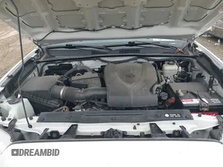 2017 Toyota Tacoma SR5 z VIN 5TFCZ5AN9HX115659, wystawiony jako IAAI lot #42375002 z przebiegiem 105 170 mil mil oraz . Historia ofert i sprzedaży dostępna na DreamBid. Obrazek 10.