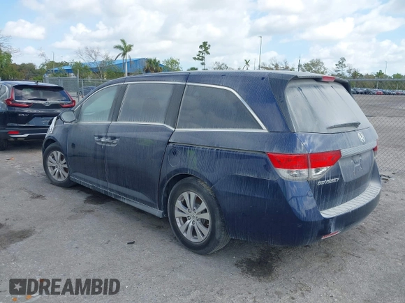 2015 Honda Odyssey EX-L z VIN 5FNRL5H65FB090177, wystawiony jako IAAI lot #41575419 z przebiegiem 128 582 mil mil oraz . Historia ofert i sprzedaży dostępna na DreamBid. Obrazek 3.