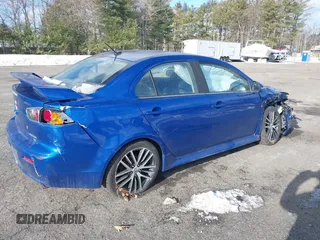 2017 Mitsubishi Lancer ES with VIN JA32V2FW1HU001811, listed as a IAAI auction lot 41378932 with 130,316 mi miles. Bid and sale history available at carsss.com. Image 4.