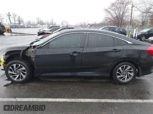 2017 Honda Civic EX z VIN 19XFC2F75HE058478, wystawiony jako IAAI lot #41957294 z przebiegiem 56 019 mil mil oraz . Historia ofert i sprzedaży dostępna na DreamBid. Obrazek 14.