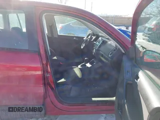 2013 Volkswagen Tiguan S with VIN WVGAV3AX2DW063067, listed as a IAAI auction lot 41638749 with 150,115 mi miles and . Bid and sale history available at DreamBid. Image 5.