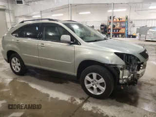 2005 Lexus RX 330 with VIN 2T2HA31UX5C083335, listed as a Copart auction lot 54007825 with 147,298 mi miles and Salvage Title. Bid and sale history available at DreamBid. Image 4.