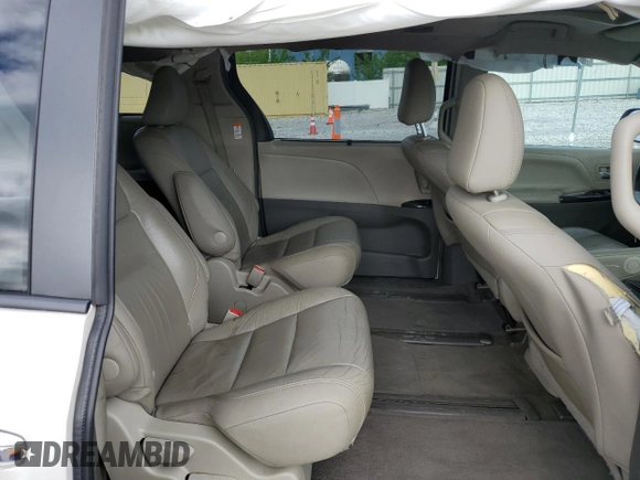 2016 Toyota Sienna Limited z VIN 5TDDK3DC8GS129290, wystawiony jako Copart lot #57039465 z przebiegiem 123 372 mil mil oraz Szkoda całkowita • Salvage title. Historia ofert i sprzedaży dostępna na DreamBid. Obrazek 11.