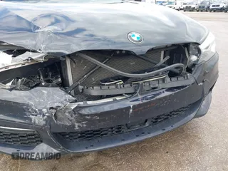 2018 BMW 5 Series 540i xDrive with VIN WBAJE7C58JWD49881, listed as a IAAI auction lot 42091065 with 73,542 mi miles and . Bid and sale history available at DreamBid. Image 6.