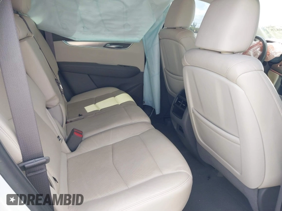 2020 Cadillac XT5 Premium Luxury FWD with VIN 1GYKNCRS7LZ129119, listed as a IAAI auction lot 41710878 with 52,575 mi miles and . Bid and sale history available at carsss.com. Image 8.