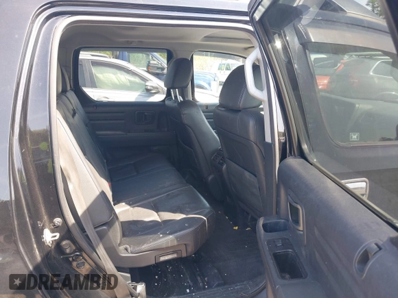 2010 Honda Ridgeline RTL z VIN 5FPYK1F56AB003730, wystawiony jako IAAI lot #42255351 z przebiegiem 190 630 mil mil oraz . Historia ofert i sprzedaży dostępna na DreamBid. Obrazek 8.