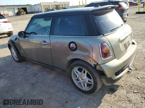 2009 MINI Hardtop S with VIN WMWMF73529TW82713, listed as a Copart auction lot 51152035 with 170,954 mi miles and Salvage title. Bid and sale history available at DreamBid. Image 2.