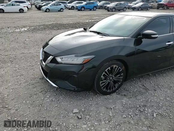 2021 Nissan Maxima SV z VIN 1N4AA6CV5MC514402, wystawiony jako Copart lot #56296955 z przebiegiem 59 428 mil mil oraz Szkoda całkowita • Salvage title. Historia ofert i sprzedaży dostępna na DreamBid. Obrazek 14.