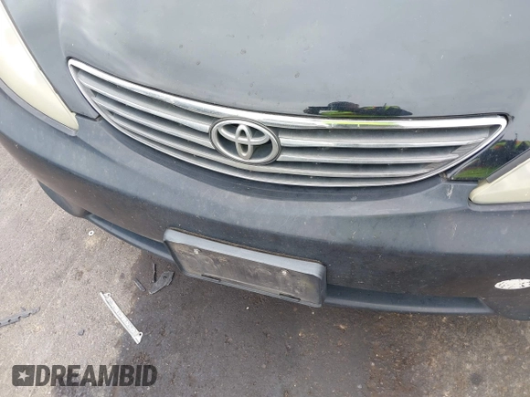 2005 Toyota Camry STD z VIN 4T1BE32K35U005795, wystawiony jako IAAI lot #42436495 z przebiegiem 216 913 mil mil oraz . Historia ofert i sprzedaży dostępna na DreamBid. Obrazek 6.