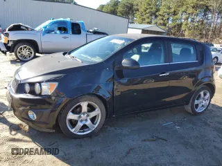 2012 Chevrolet Sonic LTZ z VIN 1G1JE6SH4C4173800, wystawiony jako Copart lot #86258534 z przebiegiem 190 853 mil mil oraz Szkoda całkowita • Salvage title. Historia ofert i sprzedaży dostępna na DreamBid. Obrazek 1.