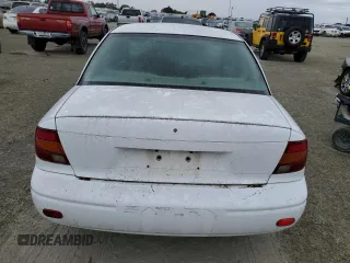 2001 Saturn SL with VIN 1G8ZF52891Z237485, listed as a Copart auction lot 76174574 with 130,525 mi miles and Salvage title. Bid and sale history available at DreamBid. Image 6.