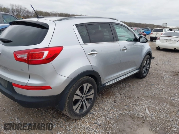 2013 Kia Sportage EX with VIN KNDPCCA22D7484936, listed as a IAAI auction lot 41921531 with 128,001 mi miles and . Bid and sale history available at DreamBid. Image 4.