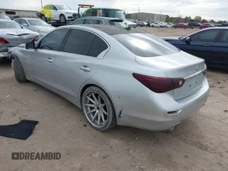 2014 Infiniti Q50 with VIN JN1BV7AP0EM681679, listed as a IAAI auction lot 41371773 with 141,940 mi miles. Bid and sale history available at carsss.com. Image 3.