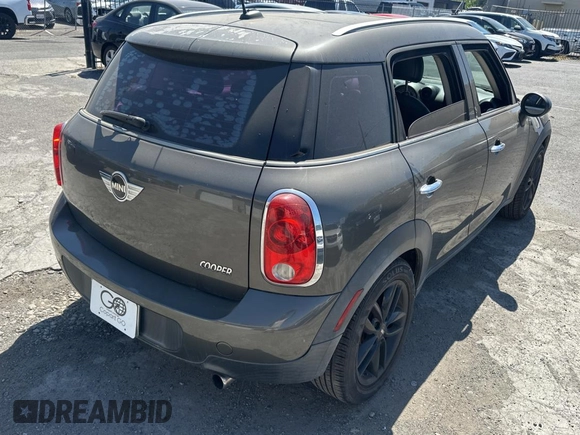 2012 MINI Countryman with VIN WMWZB3C52CWM05723, listed as a Copart auction lot 63713495 with 114,433 mi miles and Clean title. Bid and sale history available at DreamBid. Image 4.