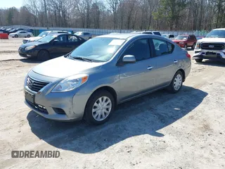 2012 Nissan Versa S with VIN 3N1CN7APXCL868911, listed as a IAAI auction lot 41762670 with 228,177 mi miles. Bid and sale history available at carsss.com. Image 2.