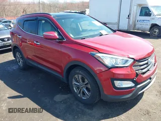 2014 Hyundai Santa Fe z VIN 5XYZUDLB3EG226857, wystawiony jako IAAI lot #41917762 z przebiegiem 42 677 mil mil oraz . Historia ofert i sprzedaży dostępna na DreamBid. Obrazek 1.