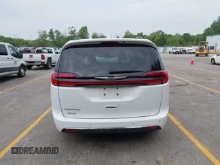 2022 Chrysler Pacifica Touring L with VIN 2C4RC1BG3NR149675, listed as a IAAI auction lot 42470593 with 59,956 mi miles and . Bid and sale history available at DreamBid. Image 16.