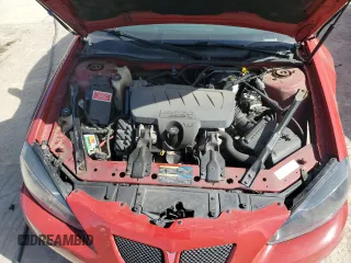 2007 Pontiac Grand Prix z VIN 2G2WP552771232143, wystawiony jako Copart lot #54544505 z przebiegiem 227 706 mil mil oraz Nie do naprawy. Historia ofert i sprzedaży dostępna na DreamBid. Obrazek 11.