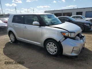 2012 Scion xB with VIN JTLZE4FE1CJ009084, listed as a Copart auction lot 50447785 with 74,155 mi miles and Salvage Title. Bid and sale history available at carsss.com. Image 4.
