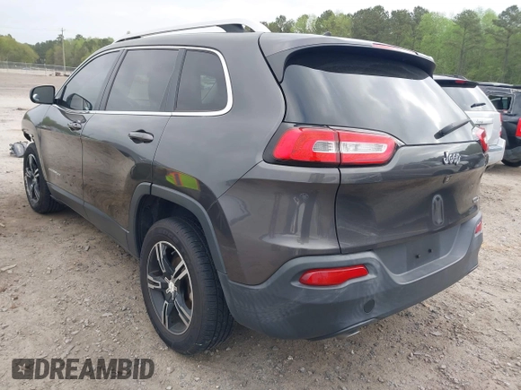 2015 Jeep Cherokee Latitude with VIN 1C4PJLCB0FW601862, listed as a IAAI auction lot 41931048 with 100,705 mi miles and . Bid and sale history available at DreamBid. Image 3.