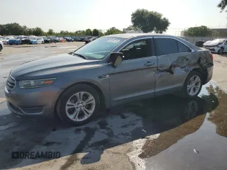 2014 Ford Taurus SEL z VIN 1FAHP2E85EG177706, wystawiony jako Copart lot #56364135 z przebiegiem 94 347 mil mil oraz Szkody całkowita. Historia ofert i sprzedaży dostępna na DreamBid. Obrazek 1.