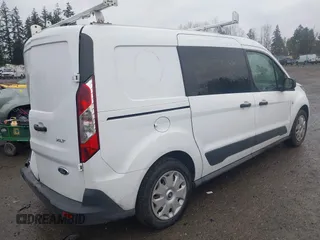 2015 Ford Transit Connect XLT z VIN NM0LS7F74F1206815, wystawiony jako IAAI lot #41211020 z przebiegiem 77 459 mil mil oraz . Historia ofert i sprzedaży dostępna na DreamBid. Obrazek 4.