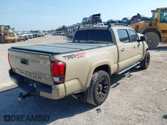 2018 Toyota Tacoma SR5 z VIN 3TMDZ5BN4JM039802, wystawiony jako IAAI lot #42300924 z przebiegiem 48 828 mil mil oraz . Historia ofert i sprzedaży dostępna na DreamBid. Obrazek 4.