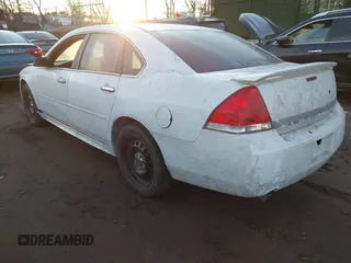 2011 Chevrolet Impala Police Police with VIN 2G1WD5EM0B1146423, listed as a IAAI auction lot 41401340 with 105,133 mi miles. Bid and sale history available at carsss.com. Image 3.