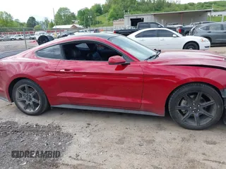 2020 Ford Mustang EcoBoost z VIN 1FA6P8TH6L5149788, wystawiony jako IAAI lot #42179624 z przebiegiem 107 520 mil mil oraz . Historia ofert i sprzedaży dostępna na DreamBid. Obrazek 13.