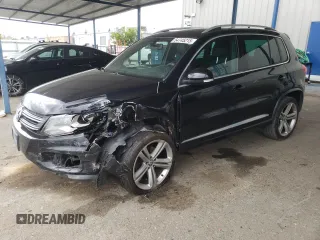 2015 Volkswagen Tiguan R-Line with VIN WVGAV7AX3FW064500, listed as a Copart auction lot 54745215 with 103,406 mi miles and Salvage Title. Bid and sale history available at DreamBid. Image 1.