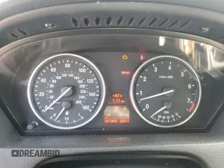 2012 BMW X5 35i z VIN 5UXZV4C51CL744313, wystawiony jako Copart lot #58270755 z przebiegiem 97 903 mil mil oraz Szkoda całkowita • Salvage title. Historia ofert i sprzedaży dostępna na DreamBid. Obrazek 9.