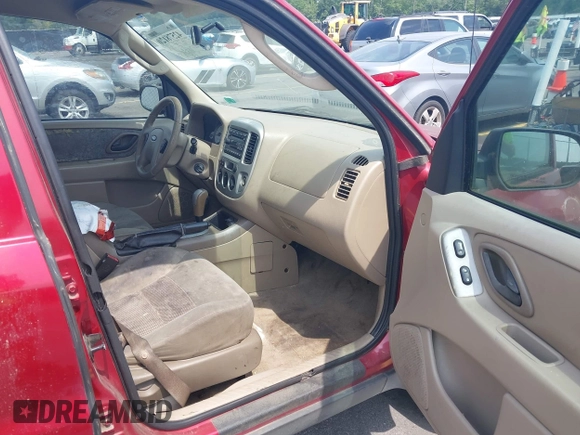 2006 Ford Escape XLT with VIN 1FMYU03136KD09448, listed as a IAAI auction lot 42578120 with 235,521 mi miles and . Bid and sale history available at DreamBid. Image 5.