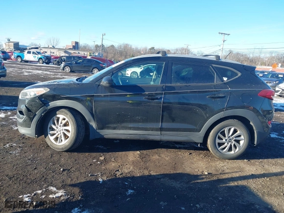 2016 Hyundai Tucson SE with VIN KM8J3CA42GU076476, listed as a IAAI auction lot 41272580 with 112,010 mi miles. Bid and sale history available at carsss.com. Image 14.