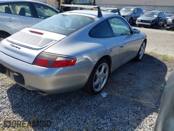 1999 Porsche 911 with VIN WP0AA2991XS623852, listed as a IAAI auction lot 42207441 with 100,548 mi miles and . Bid and sale history available at DreamBid. Image 4.