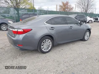 2013 Lexus ES 4dr Sdn with VIN JTHBK1GG0D2074698, listed as a IAAI auction lot 42049070 with 117,036 mi miles. Bid and sale history available at carsss.com. Image 4.