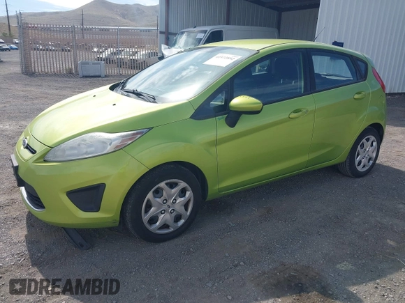 2011 Ford Fiesta SE with VIN 3FADP4EJ8BM157173, listed as a IAAI auction lot 41972892 with 407,227 mi miles. Bid and sale history available at carsss.com. Image 2.