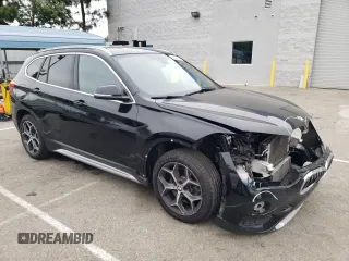 2018 BMW X1 sDrive28i with VIN WBXHU7C32J5L06825, listed as a Copart auction lot 49403143 with 93,723 mi miles. Bid and sale history available at carsss.com. Image 4.
