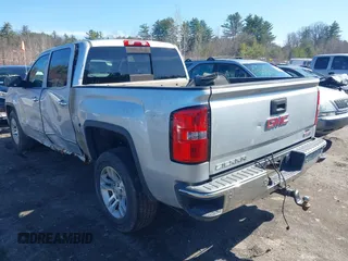 2014 GMC Sierra 1500 SLT z VIN 3GTU2VECXEG107524, wystawiony jako IAAI lot #41934665 z przebiegiem 60 032 mil mil oraz . Historia ofert i sprzedaży dostępna na DreamBid. Obrazek 3.