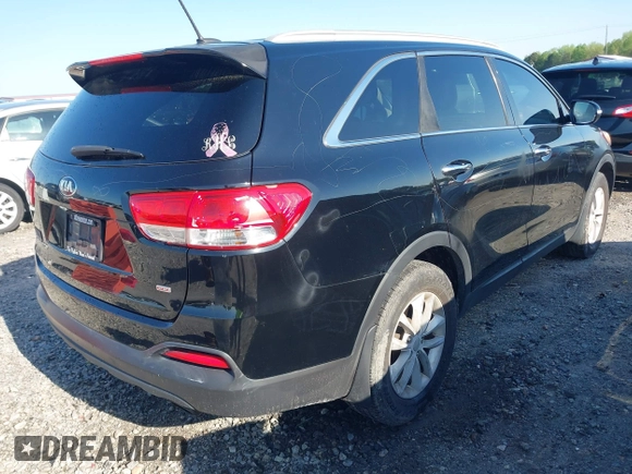 2016 Kia Sorento LX with VIN 5XYPG4A36GG170121, listed as a IAAI auction lot 41941691 with 240,609 mi miles and . Bid and sale history available at carsss.com. Image 4.