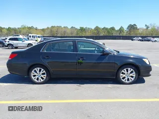 2010 Toyota Avalon XL with VIN 4T1BK3DBXAU361354, listed as a IAAI auction lot 41863124 with 163,625 mi miles and . Bid and sale history available at DreamBid. Image 14.